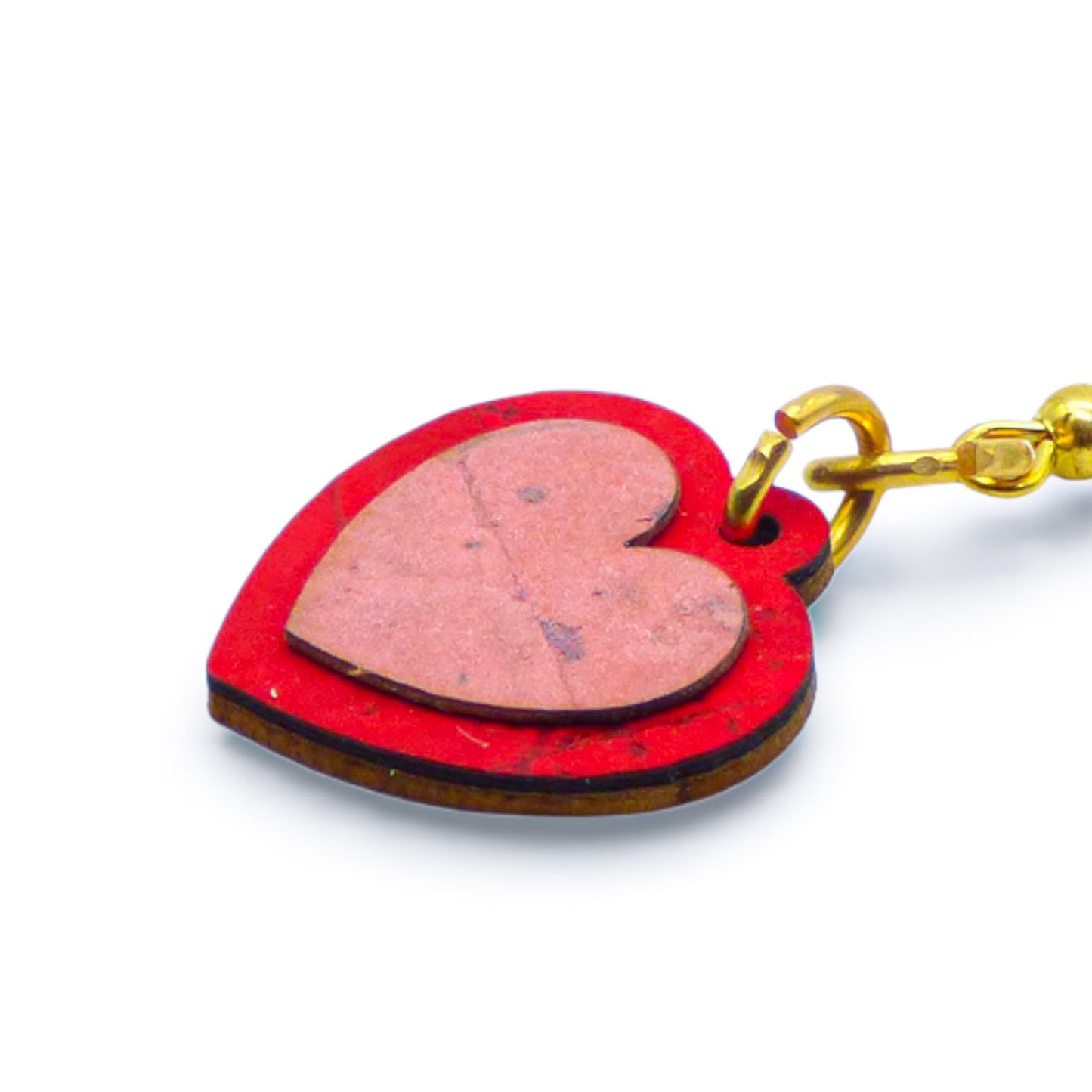 Boucles d'oreilles en liège "Petits Coeurs" d'Artipel, avec des cœurs rouges et roses, présentées sur un fond neutre.