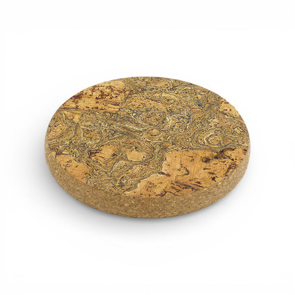 Viking round iceberg grey trivet on a table, showcasing a sleek design and durable material for hot dishes.