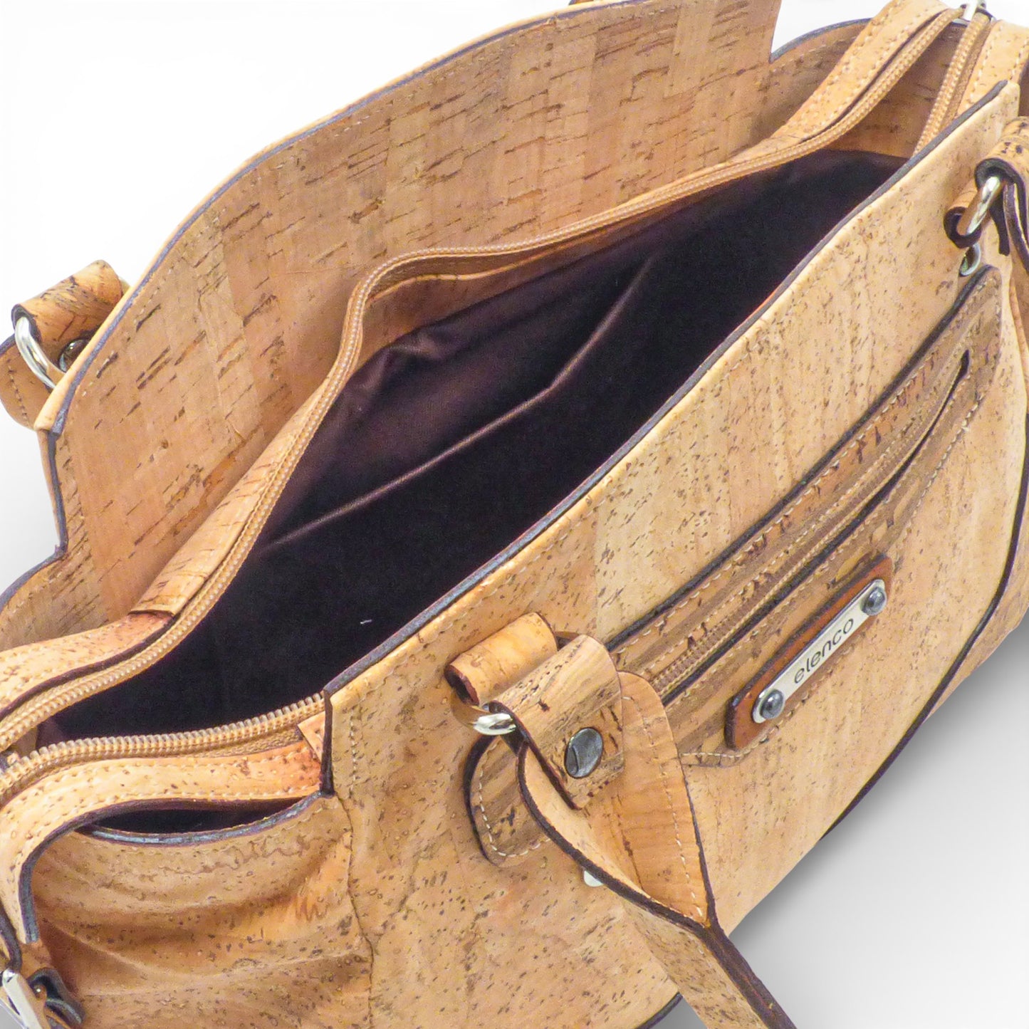 Sac à main trapèze en cuir noir de la marque Elenco, avec des détails élégants et une forme moderne.