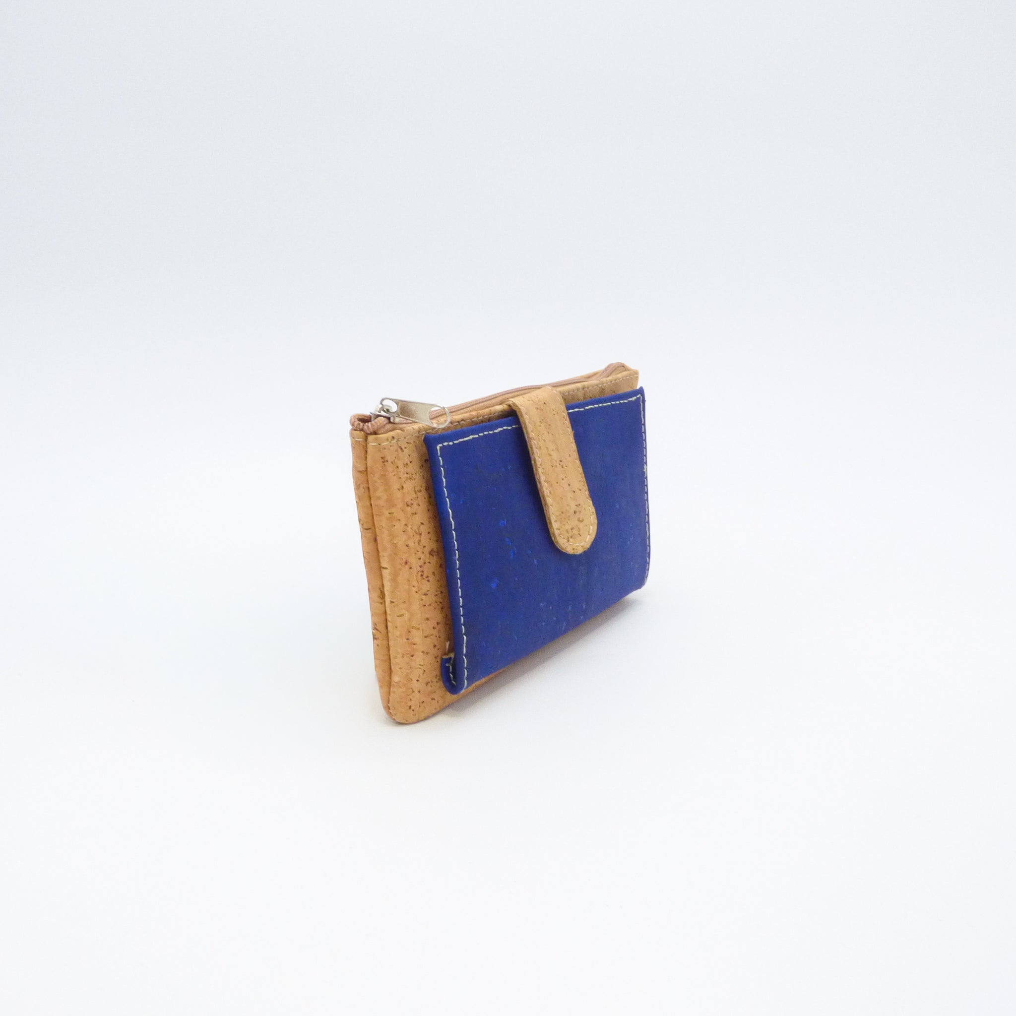 Cork wallet and card holder by Amador Varum, featuring a textured natural finish and multiple card slots.