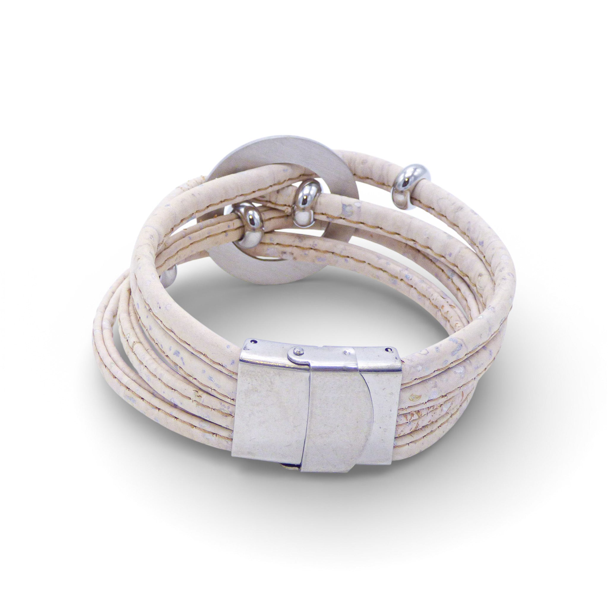 Multi-layered bracelet with central medallion in cork colors, featuring a large silver clasp detail.