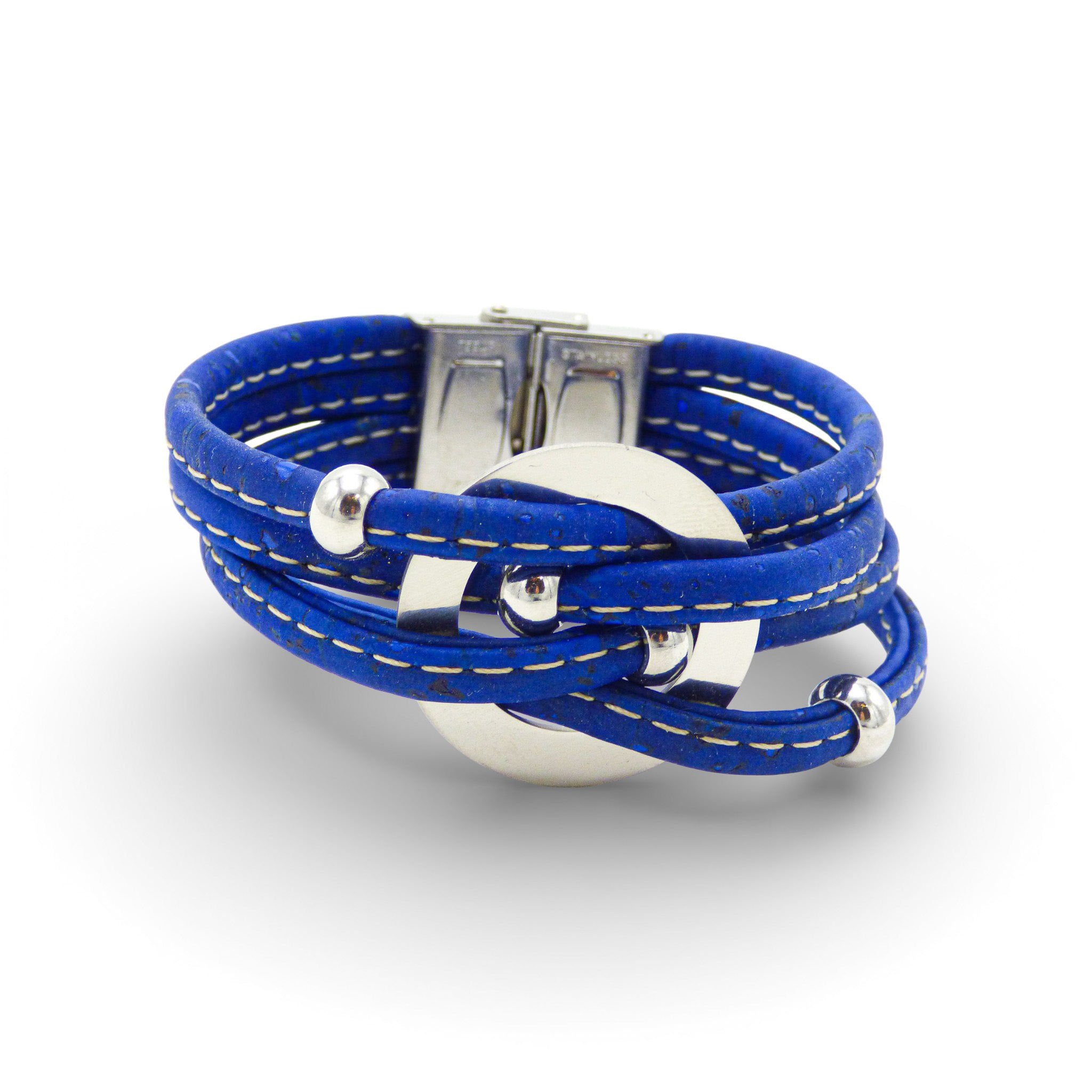 Multi-strand bracelet with a central medallion in vibrant cork colors by Cork Colors, featuring a large silver clasp.