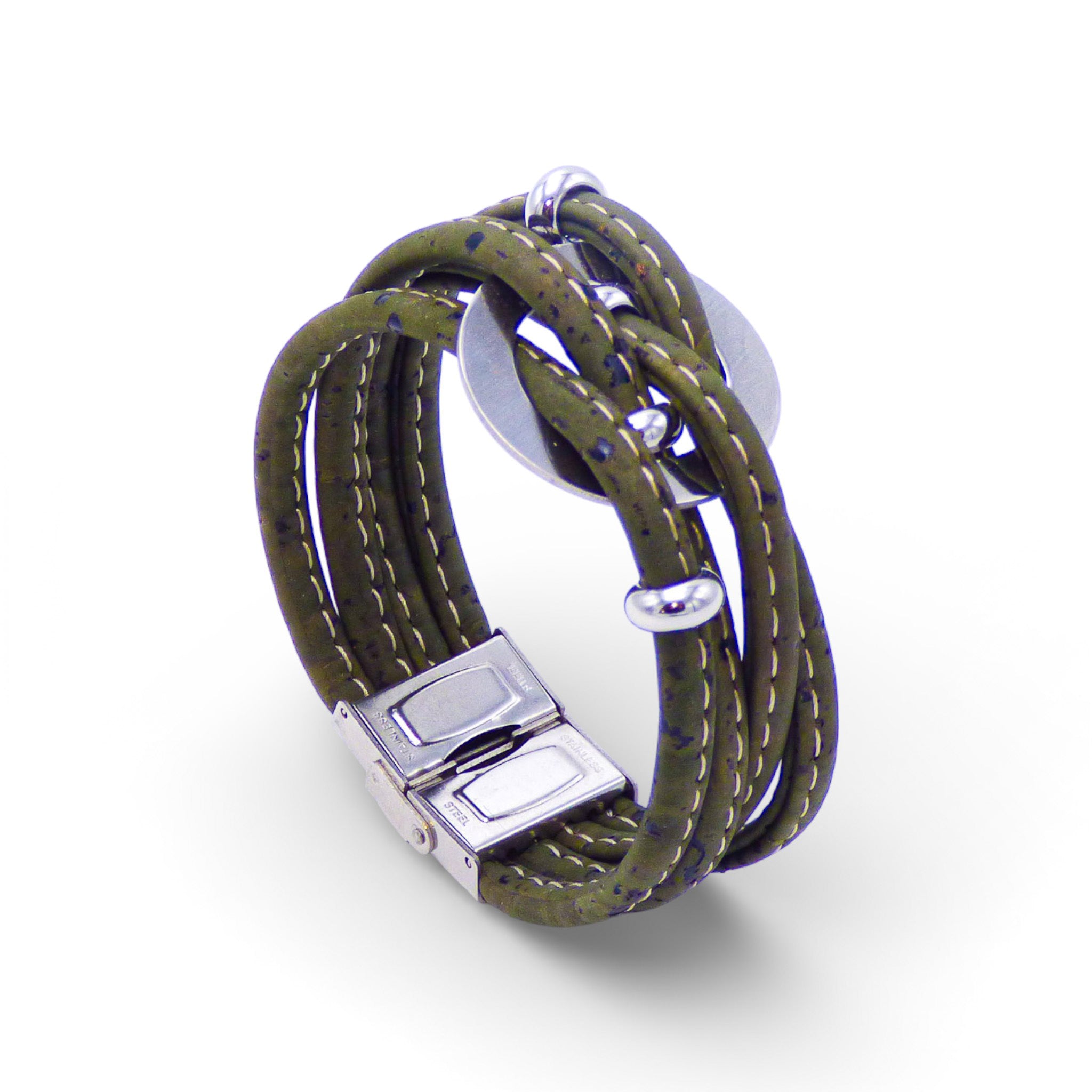 Multi-layered bracelet with a central medallion in earthy tones by Cork Colors, featuring a large silver clasp.