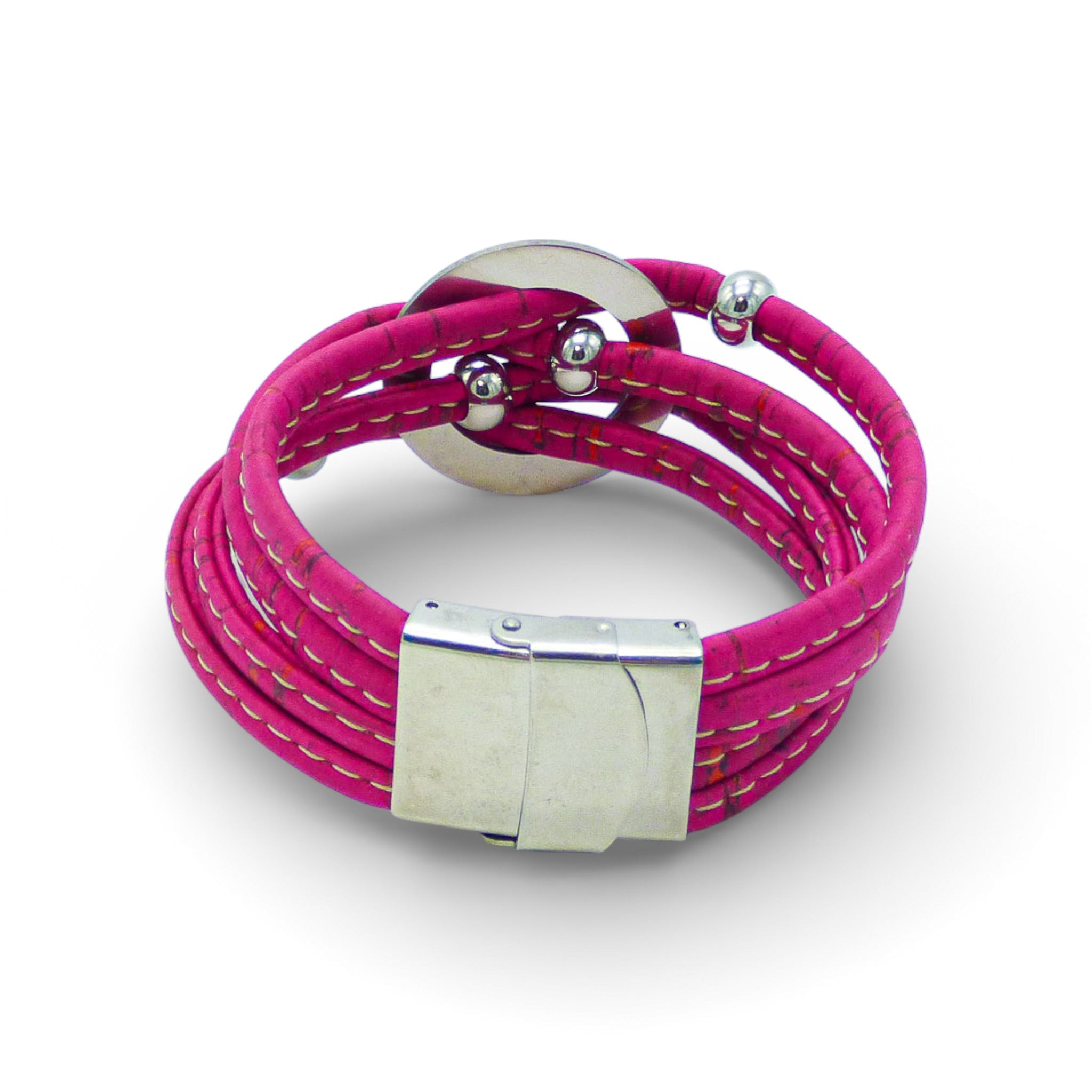 Multi-layered bracelet with central medallion in pink cork by Cork Colors featuring a silver clasp.