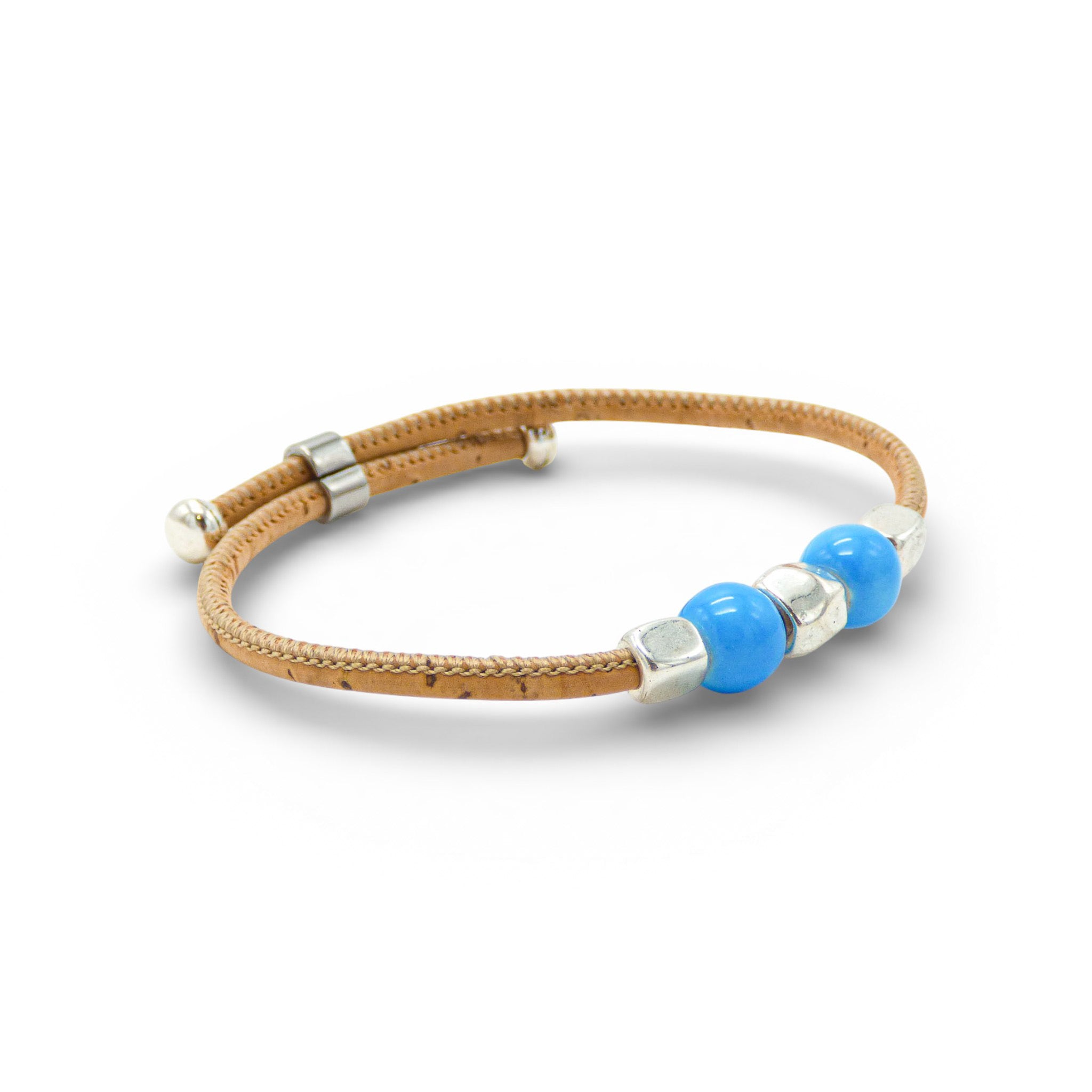 Cork Colors Fin Perlé bracelet featuring blue cork and silver clasp, showcasing a delicate and elegant design.