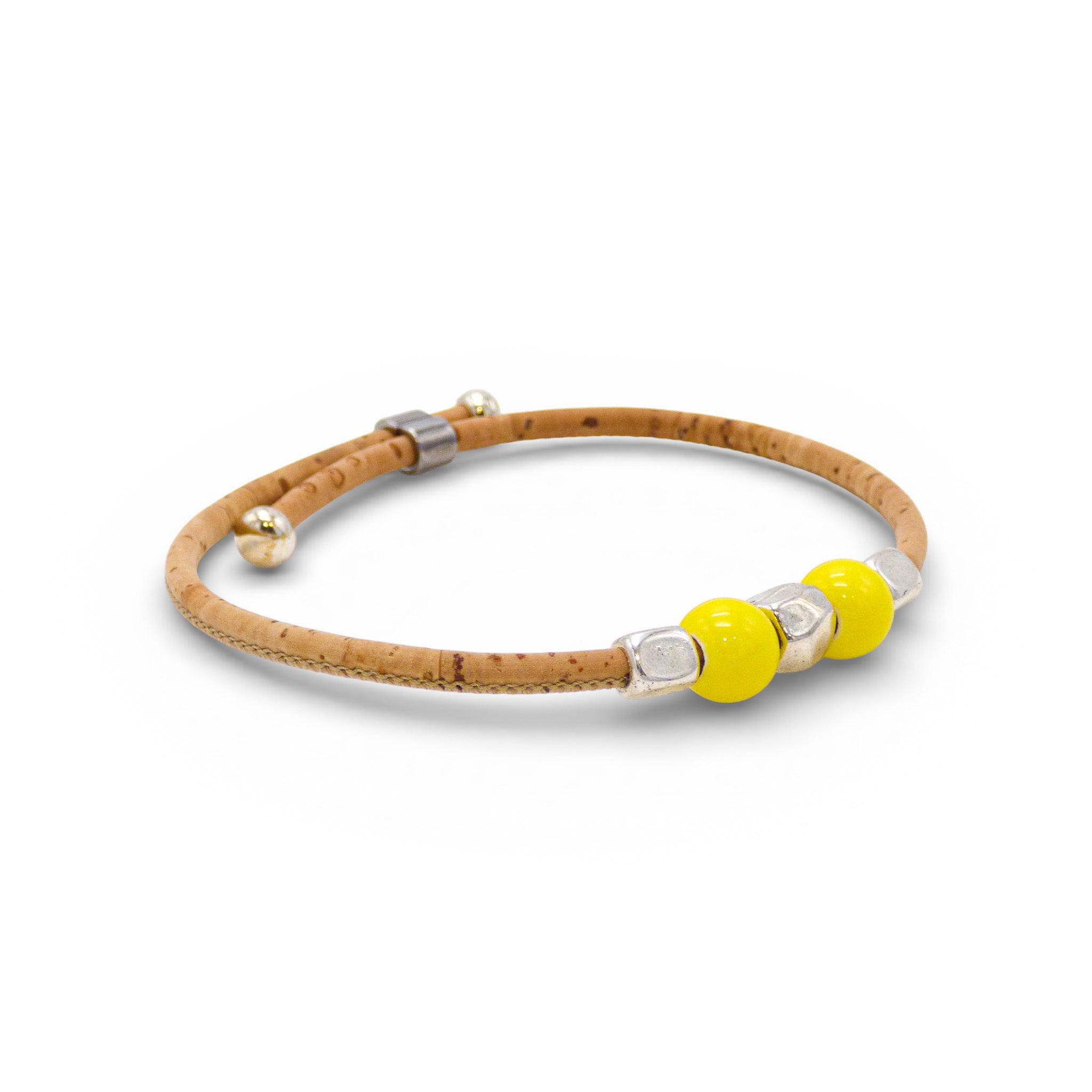 Delicate Jonc Fin Perlé bracelet by Cork Colors in yellow cork with pearl accents and a silver clasp.