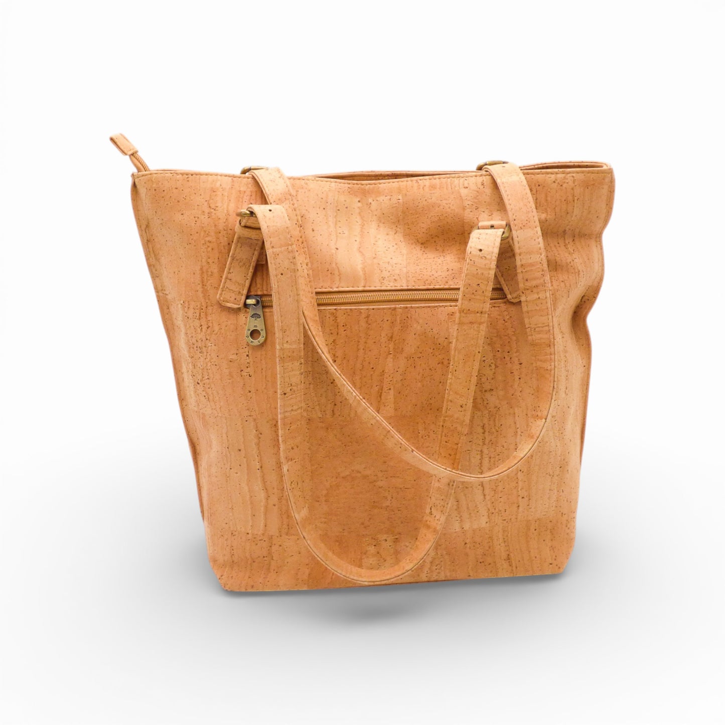 Sac épaule Montado en liège, affichant un design élégant et une texture naturelle, posé sur un fond neutre.