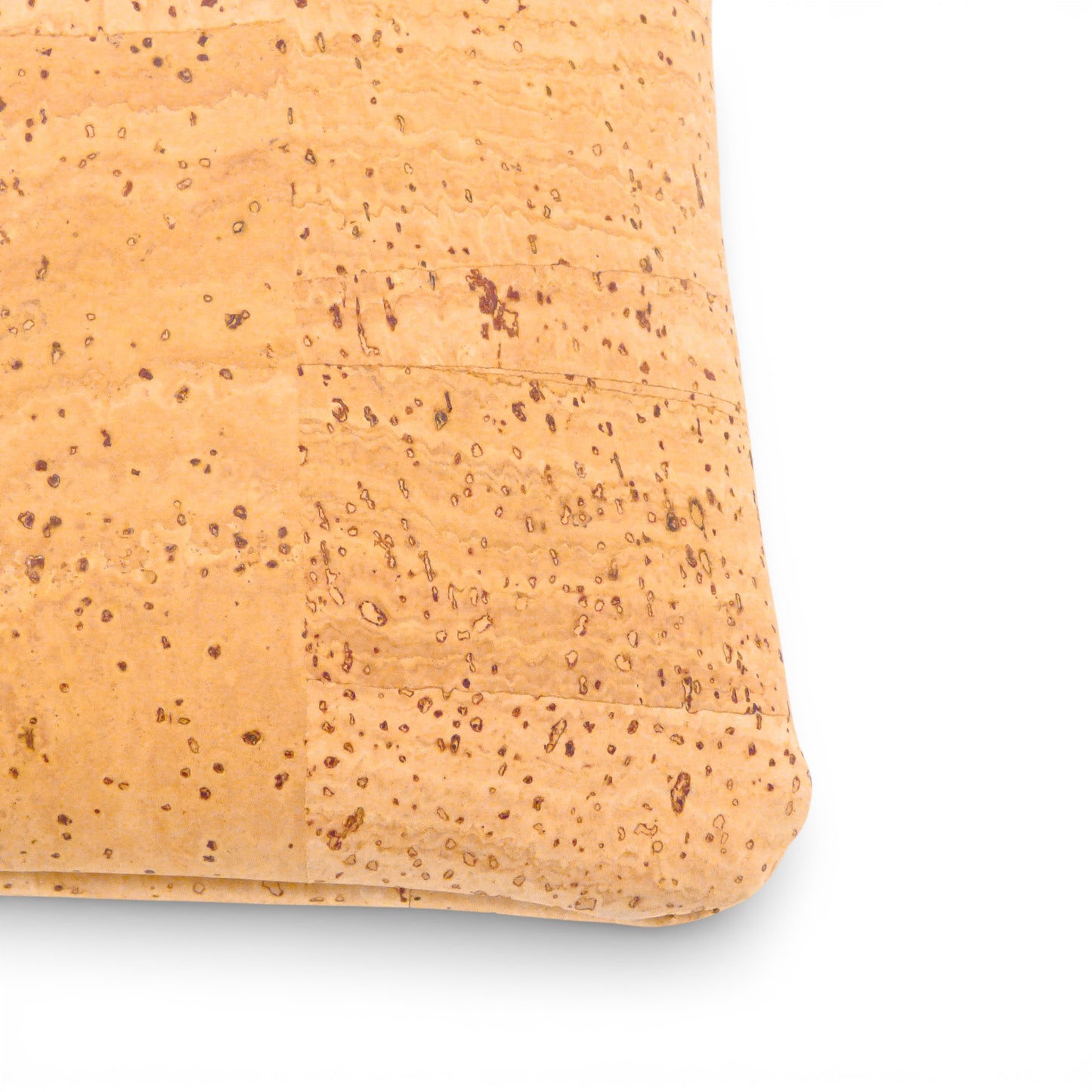 Natural cork pouch by Artipel with hand-stitched details, showcasing eco-friendly design and texture.