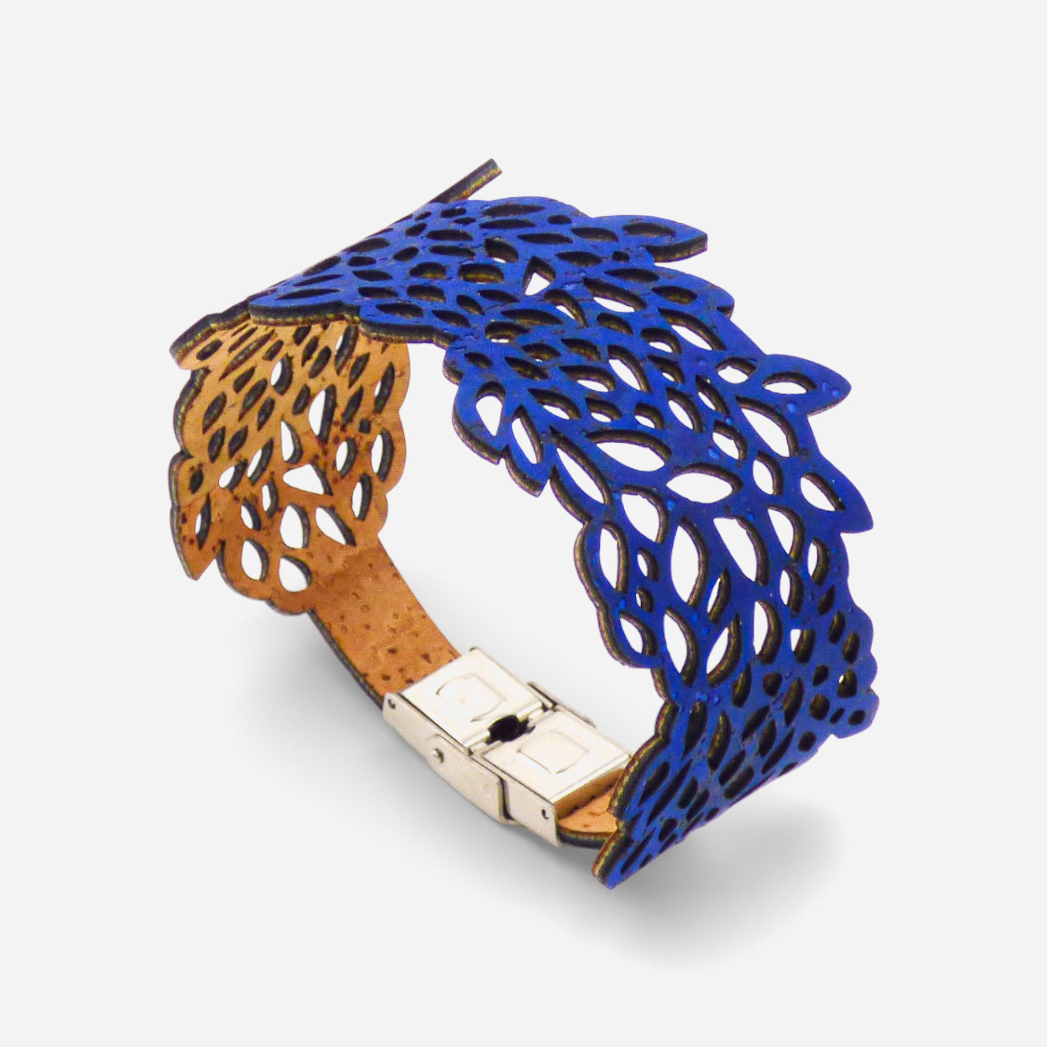 Blue electric lace-patterned cork bracelet for women by Cork Colors, showcasing intricate foliage design.