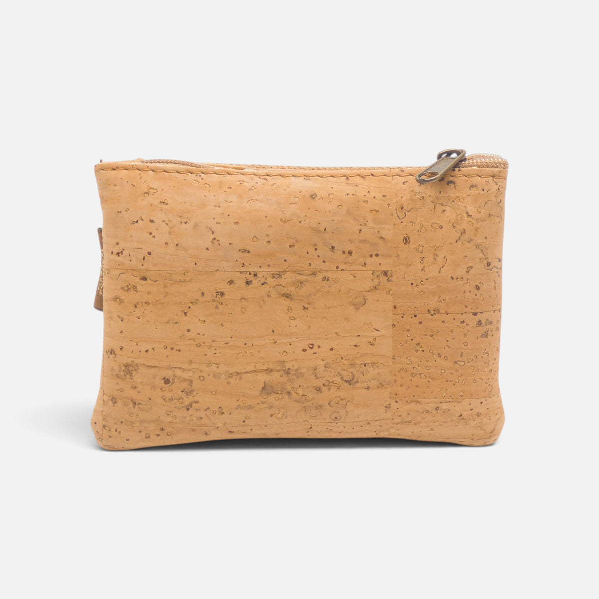Dos naturel uni d'un porte-monnaie en liège, surface lisse sans couture