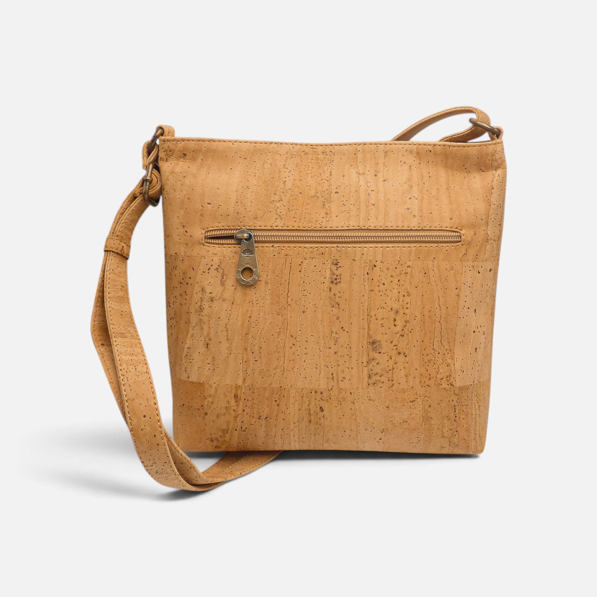 Dos d'un sac bandoulière en liège avec poche zippée, accès rapide aux papiers