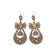 Boucles d'oreilles volutes en liège ajouré, vue de face — Artipel, crochets dorés, Portugal