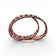 Double heart-shaped natural cork bracelet with gold accents, showcasing a magnetic closure, by Artipel.
