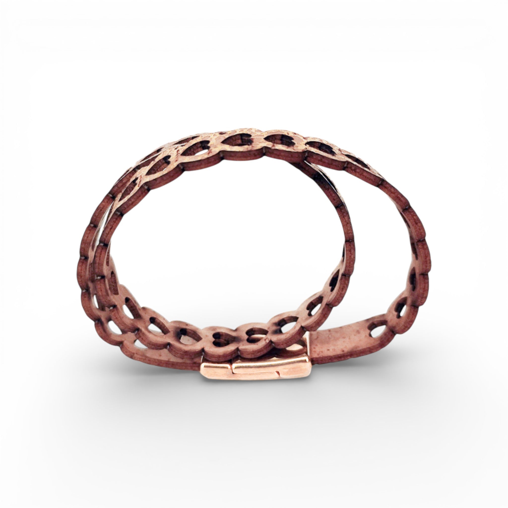Double heart-shaped natural cork bracelet with gold accents, showcasing a magnetic closure, by Artipel.