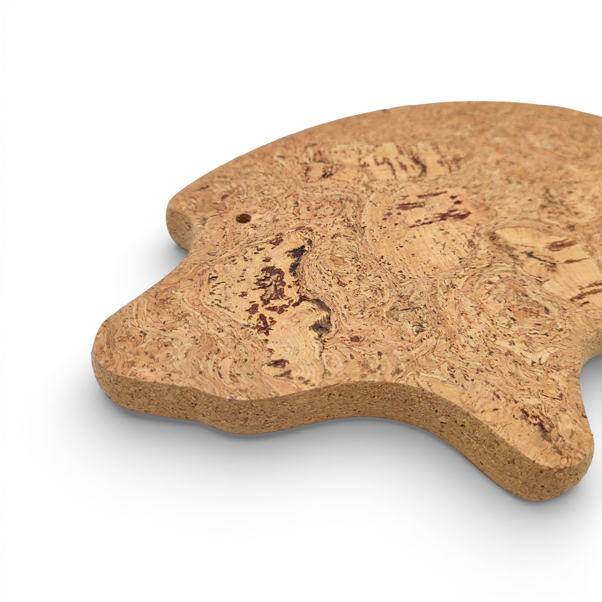 Viking cochon natural cork trivet, featuring a charming pig design for stylish tabletop protection.