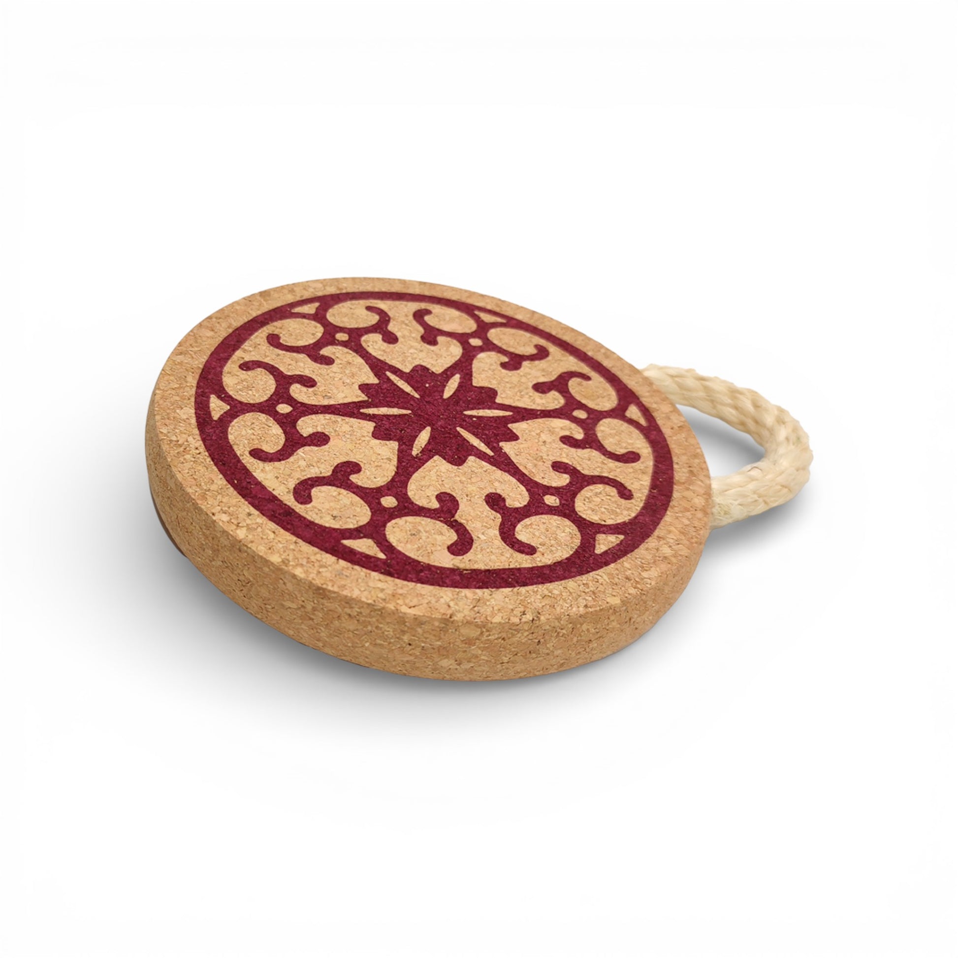 Viking red cork trivet featuring an elegant design, perfect for protecting surfaces from hot dishes.