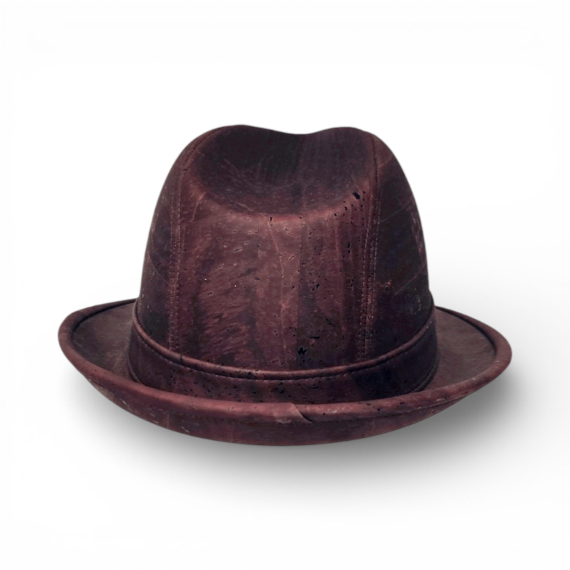 Chapeau trilby en liège naturel de la marque Amador Varum, vue de profil avec bord large et texture unique.