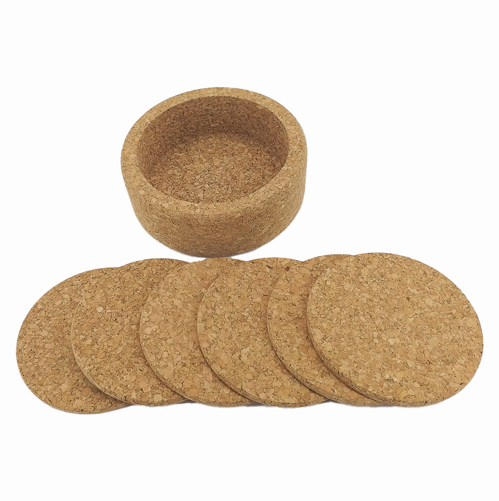 Cork coasters set with a bottle holder, featuring Viking design by Artipel, displayed on a wooden table.