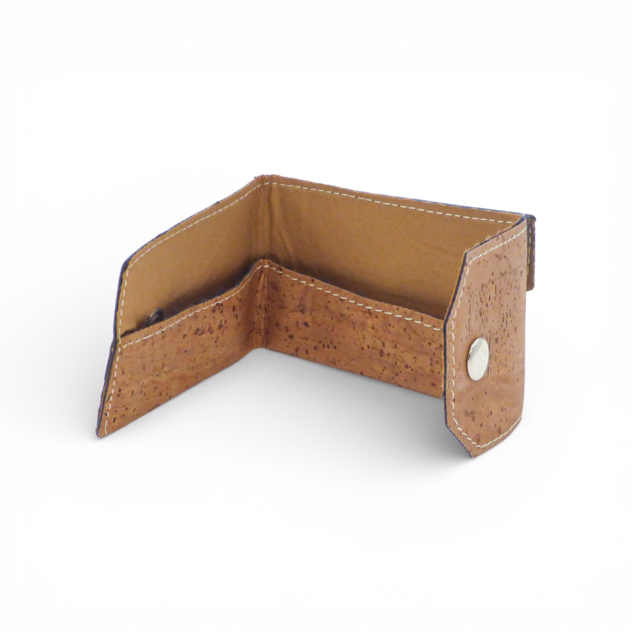 Biface card holder and coin purse by Amador Varum in a stylish design, showcasing its sleek leather texture and functionality.