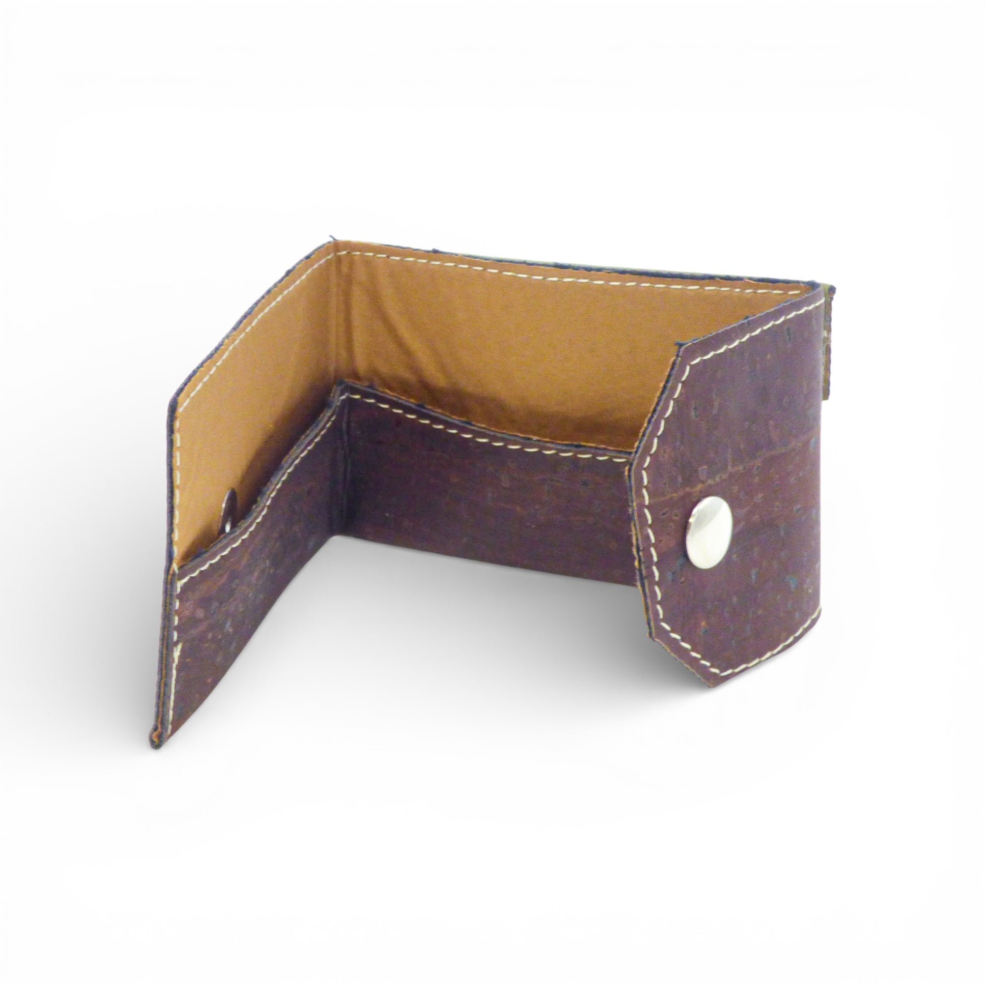 Biface cardholder and coin purse by Amador Varum, showcasing a sleek design and functional compartments.
