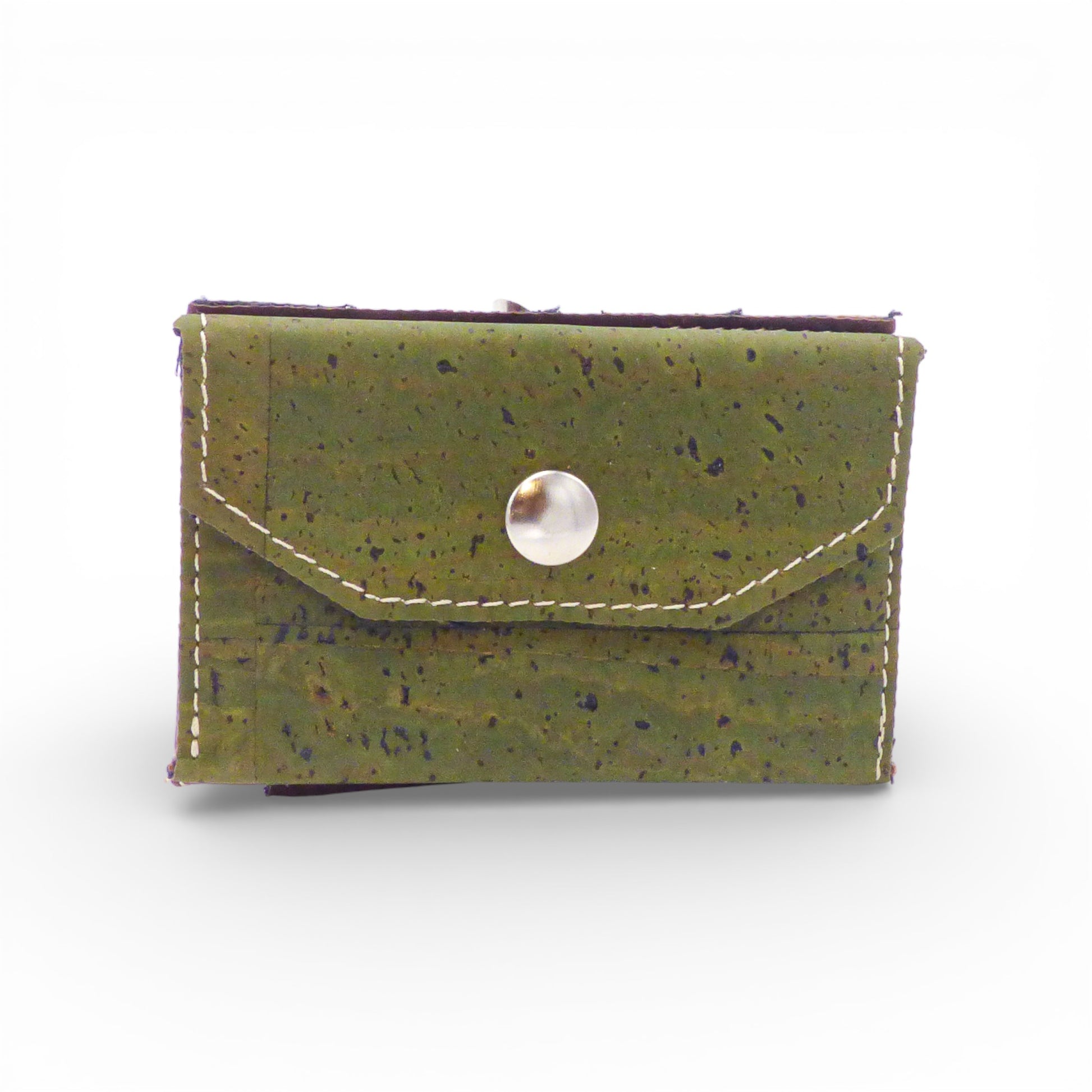 Biface cardholder and coin pouch by Amador Varum, showcasing elegant design and textured material in a stylish setting.