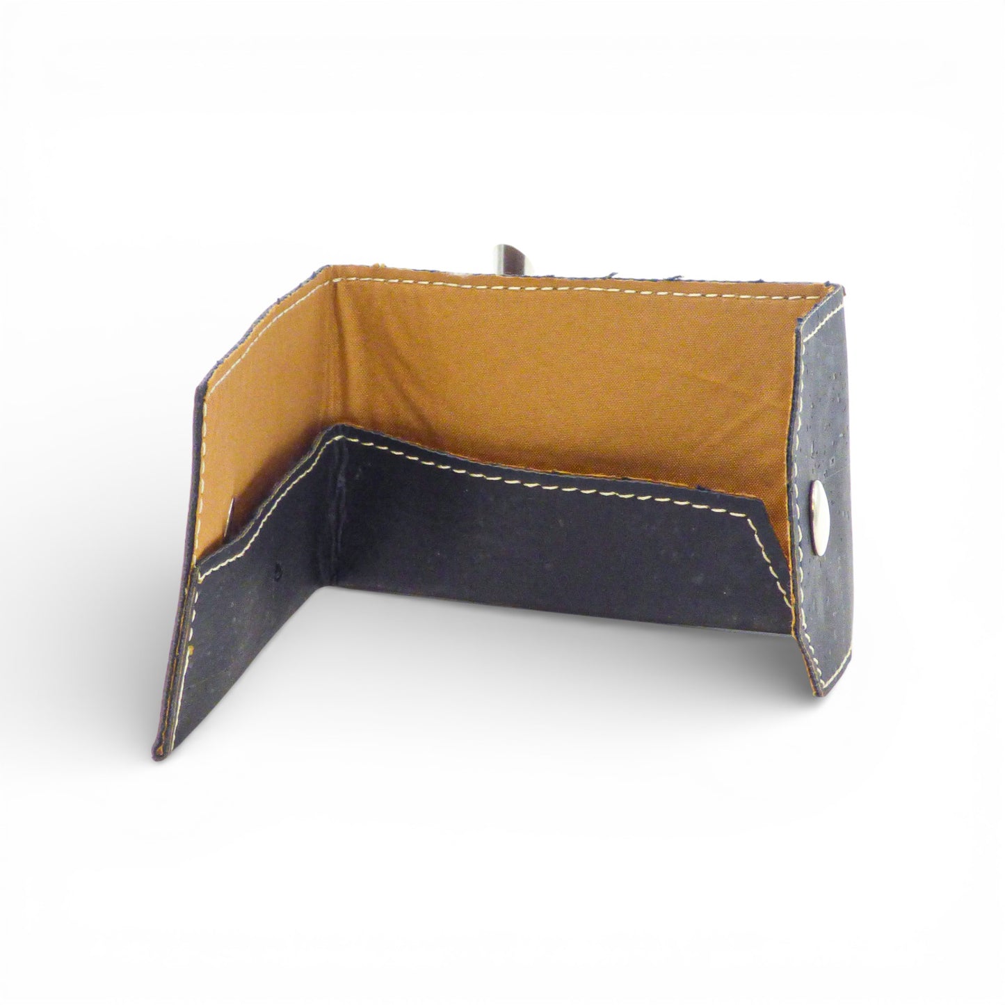 Biface cardholder and coin purse by Amador Varum in stylish design, showcasing multiple card slots and coin compartment.