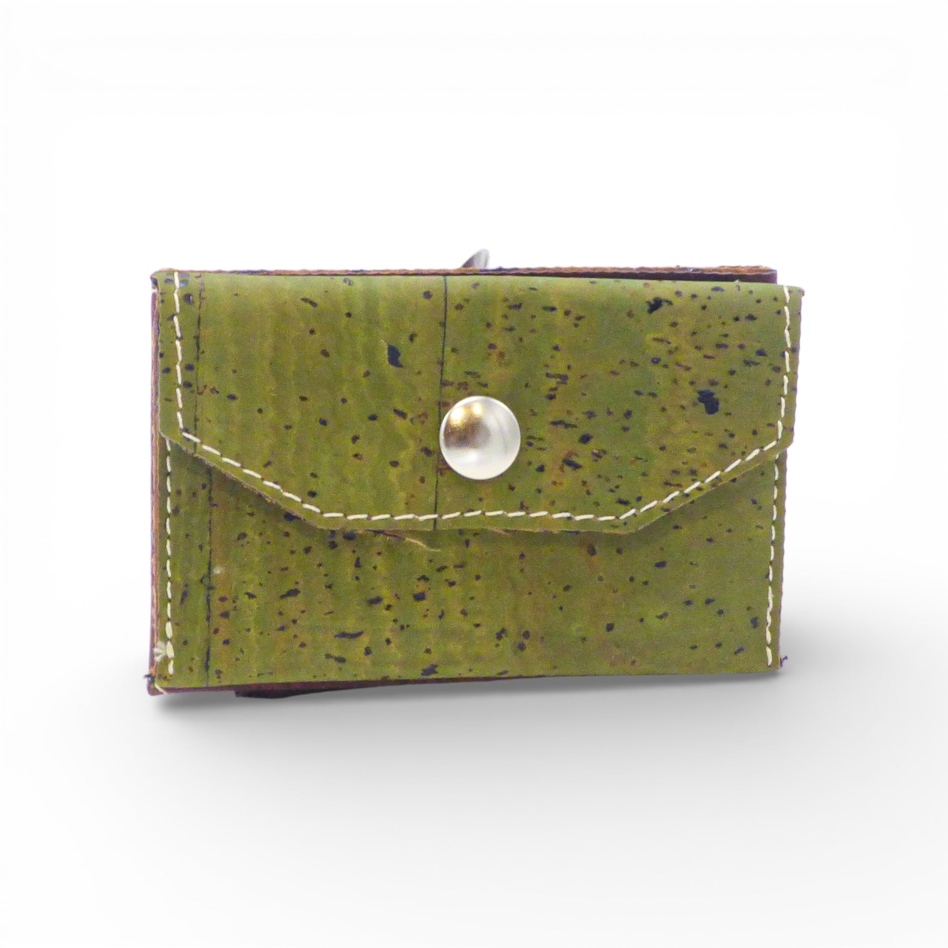 Biface card holder and coin purse by Amador Varum, featuring a sleek design and textured finish.