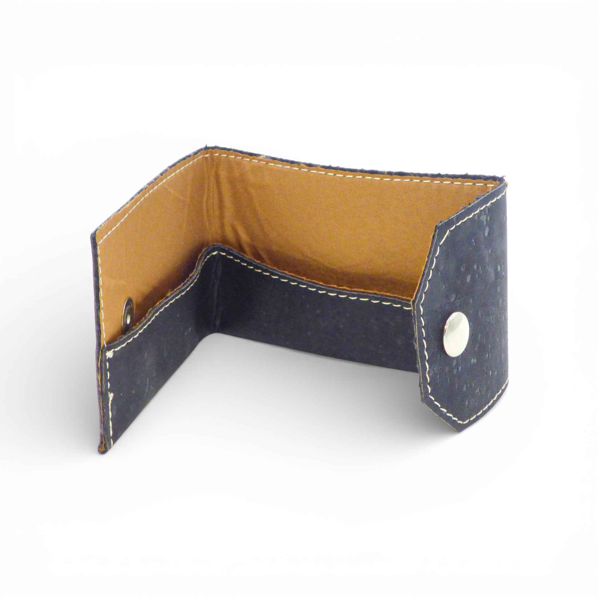 Biface porte-cartes et monnaie Amador Varum, en cuir, avec design élégant et compartiments visibles pour cartes et pièces.