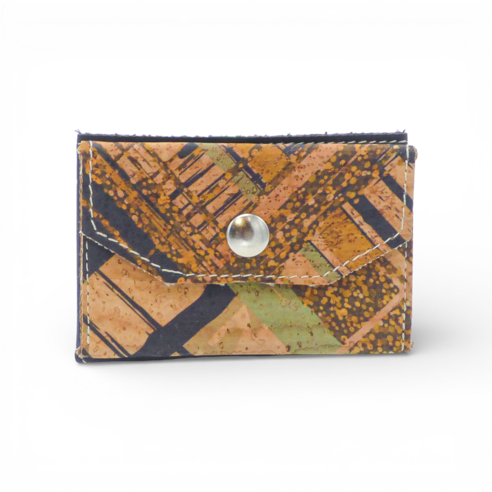 Biface wallet cardholder by Amador Varum, featuring a sleek design with compartments for cards and coins.