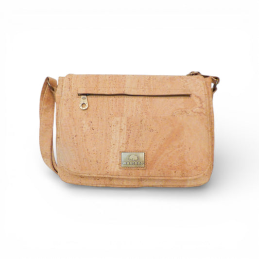 Sac bandoulière "Besace" Montado en cuir marron avec bandoulière ajustable et logo visible sur le devant.