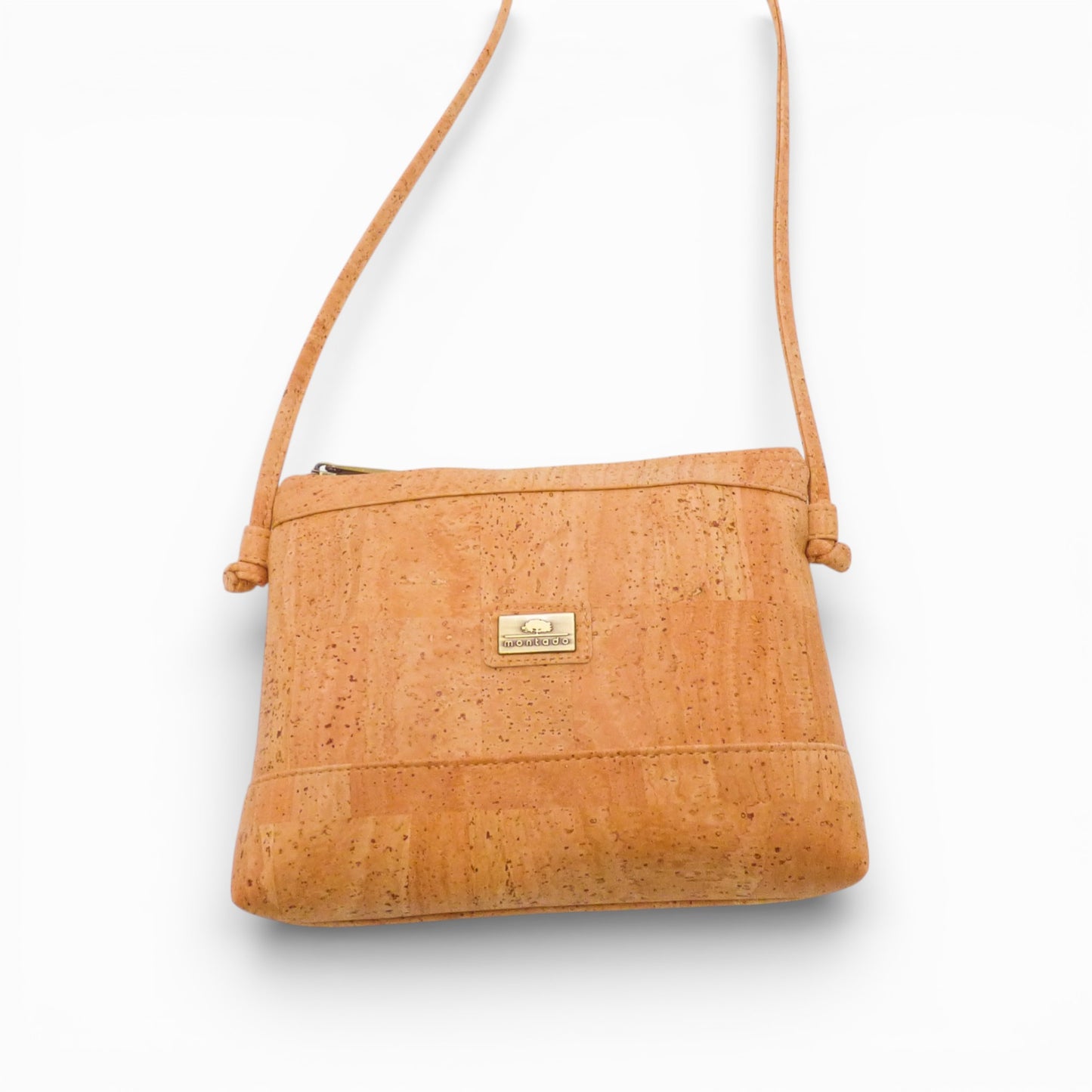 Moyenne pochette en liège bandeau de la marque Home & Liège, montrant la texture et le design élégant du produit.