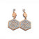 Boucles d'oreilles hexagone ajouré bleu gris en liège, de face — Artipel, Portugal