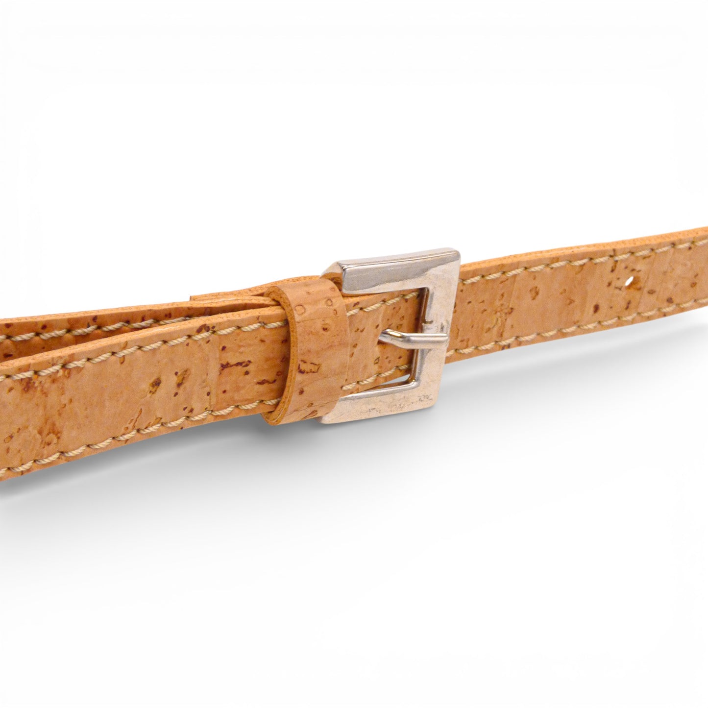 Detail view of Artipel natural cork pouch with fine buckle adjustment and strap.