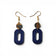 Boucles d'oreilles pendantes en liège bleu nuit, forme ovale ajourée et crochets dorés