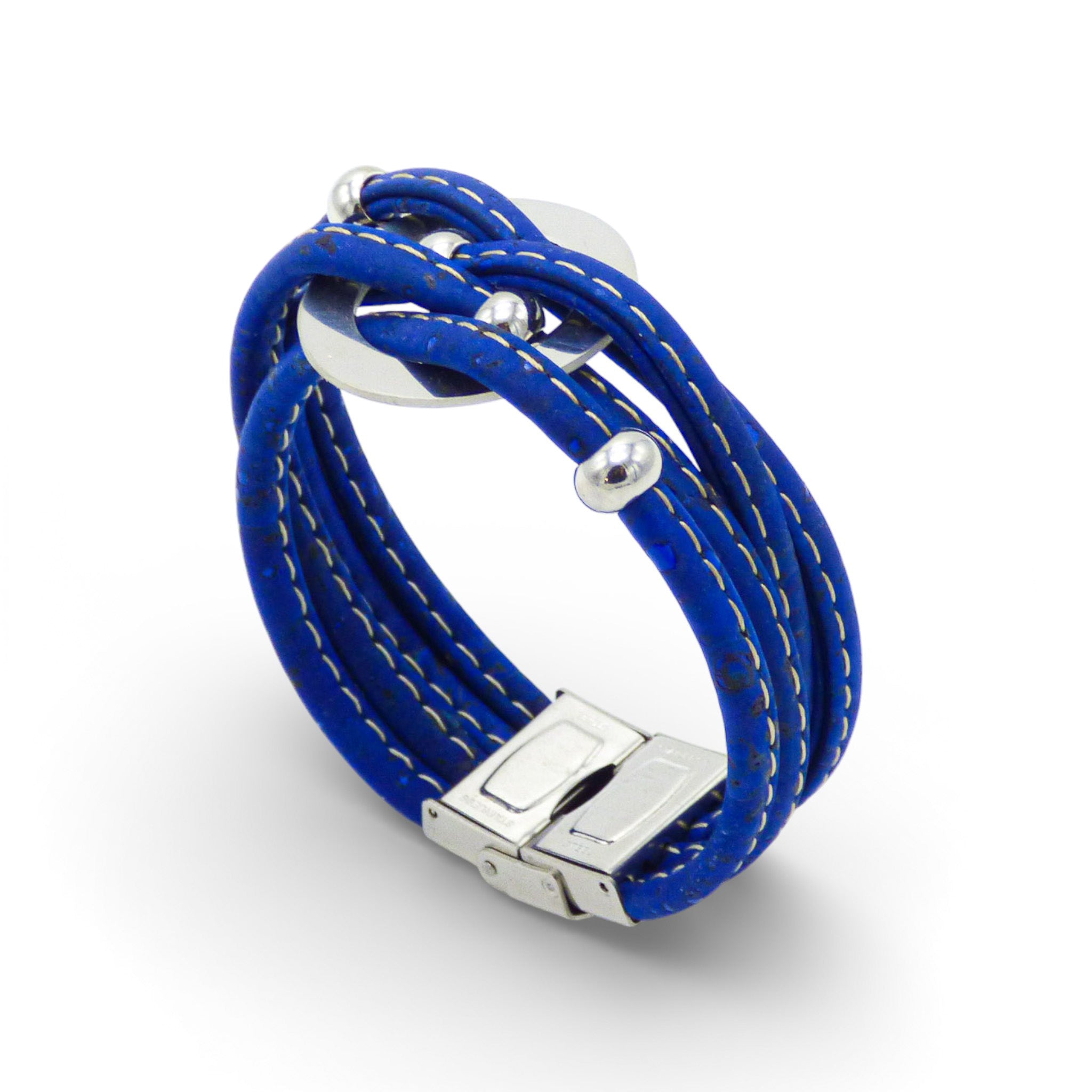 Multi-strand bracelet with central medallion in vibrant colors by Cork Colors, featuring a silver clasp and textured design.