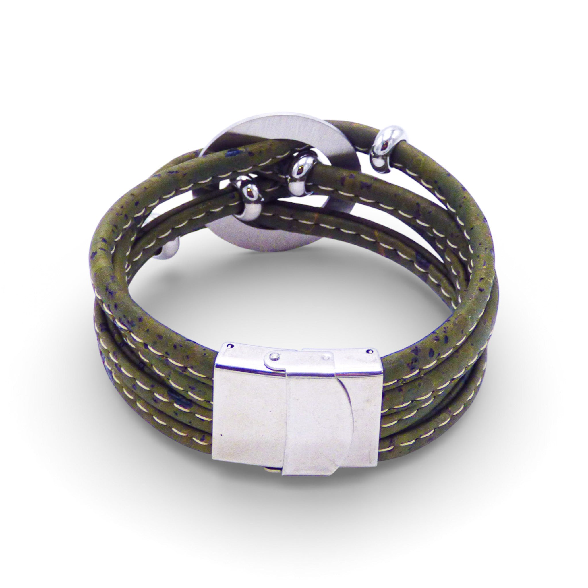 Multi-strand bracelet with central medallion in earthy tones by Cork Colors, featuring a large silver clasp.