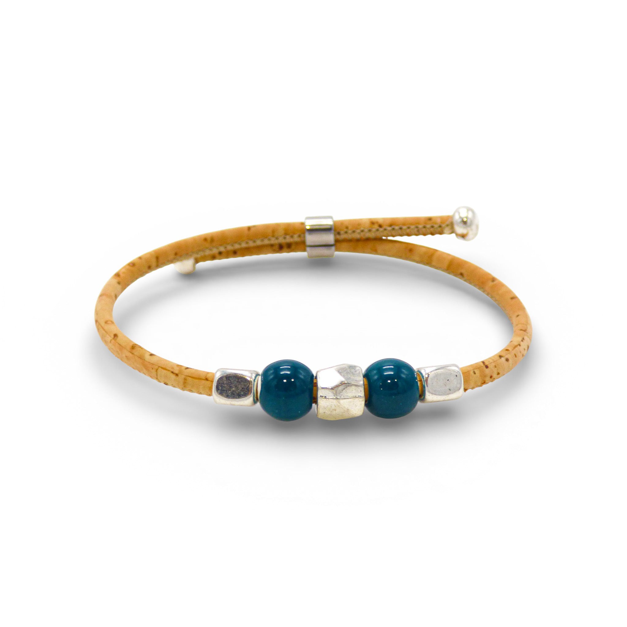 Delicate Cork Colors bracelet with a thin design, featuring teal pearls and a silver clasp. Perfect for minimalist jewelry lovers.