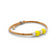Delicate Jonc Fin Perlé bracelet by Cork Colors in yellow cork with pearl accents and a silver clasp.