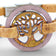Delicate Cork Colors bracelet featuring a gold-tone Tree of Life medallion on a pale pink and red cork band.
