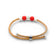 Delicate Cork Colors bracelet with red pearls and silver clasp, showcasing a fine, minimalist design.