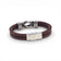 Brown steel knot bracelet for men by Cork Colors, showcasing a unique marine knot design on a cork material.