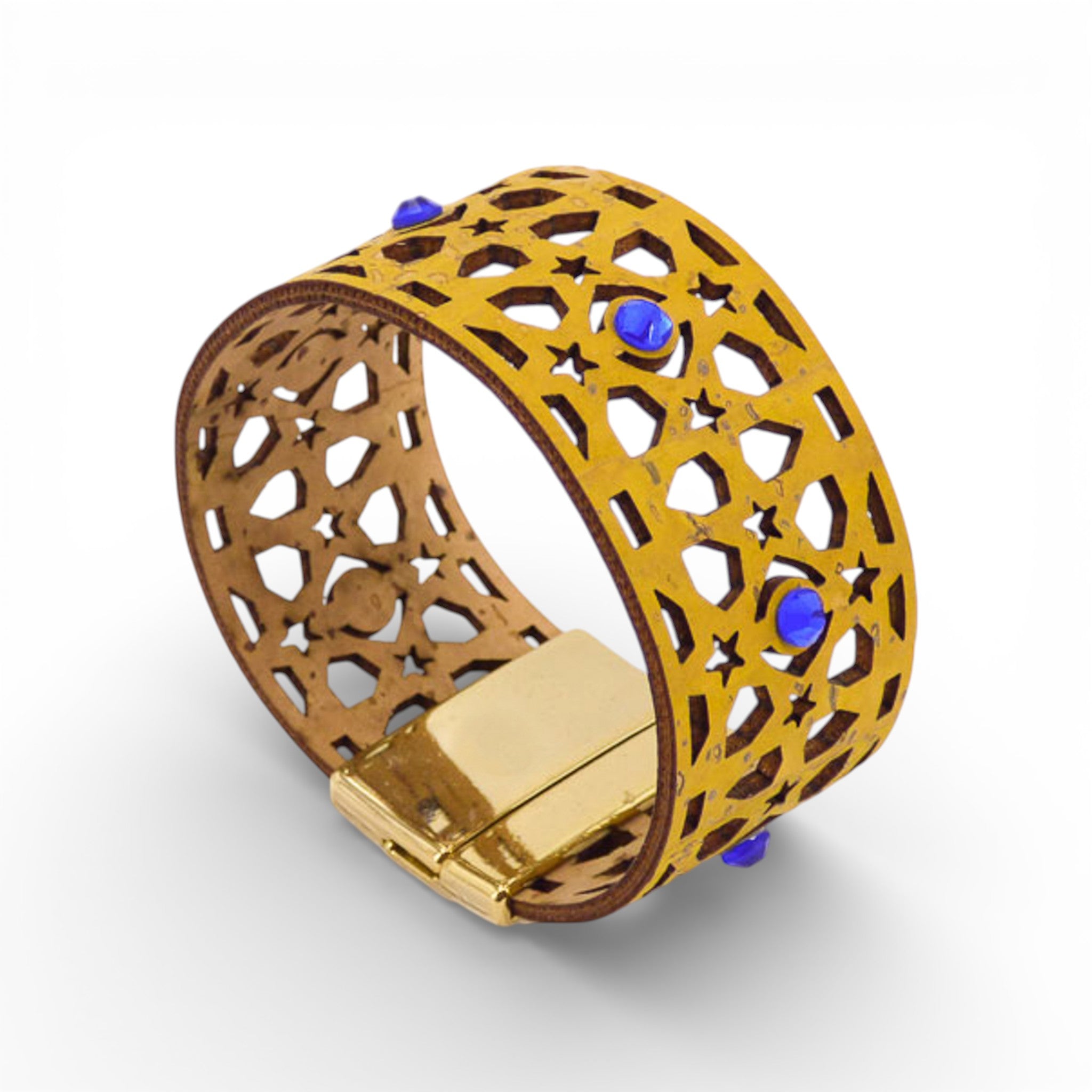 Yellow ajouré leather cuff bracelet with magnetic closure by Artipel, showcasing intricate design and feminine style.