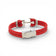 Gros plan sur l'ancre marine acier d'un bracelet en liège rouge — Cork Colors, Portugal