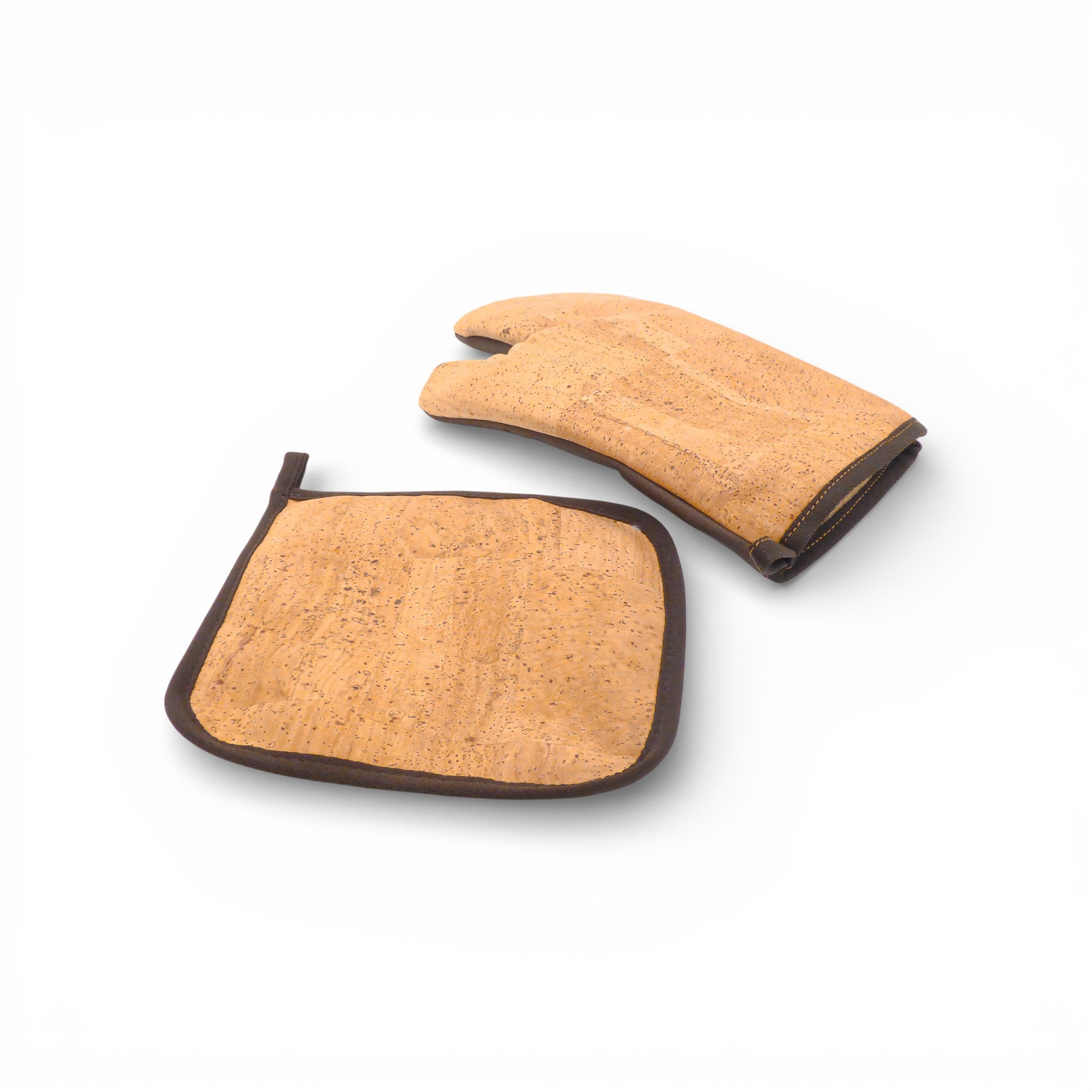 Gant de cuisine et manique en liège Amador Varum, montrant une texture naturelle et un design élégant pour l'art de la table.