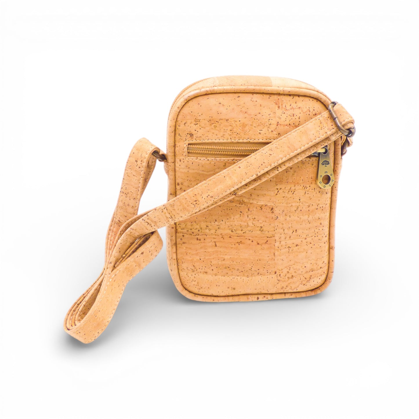 Mini Sacoche Homme "L'Essentiel" by Montado, showcasing a stylish and compact men's bag in a natural setting.