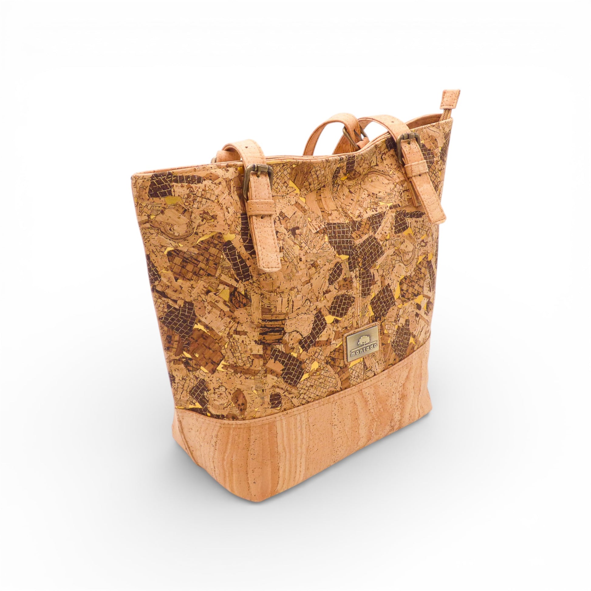 Sac épaule Montado en liège, affichant une texture naturelle et un design élégant avec des poignées confortables.