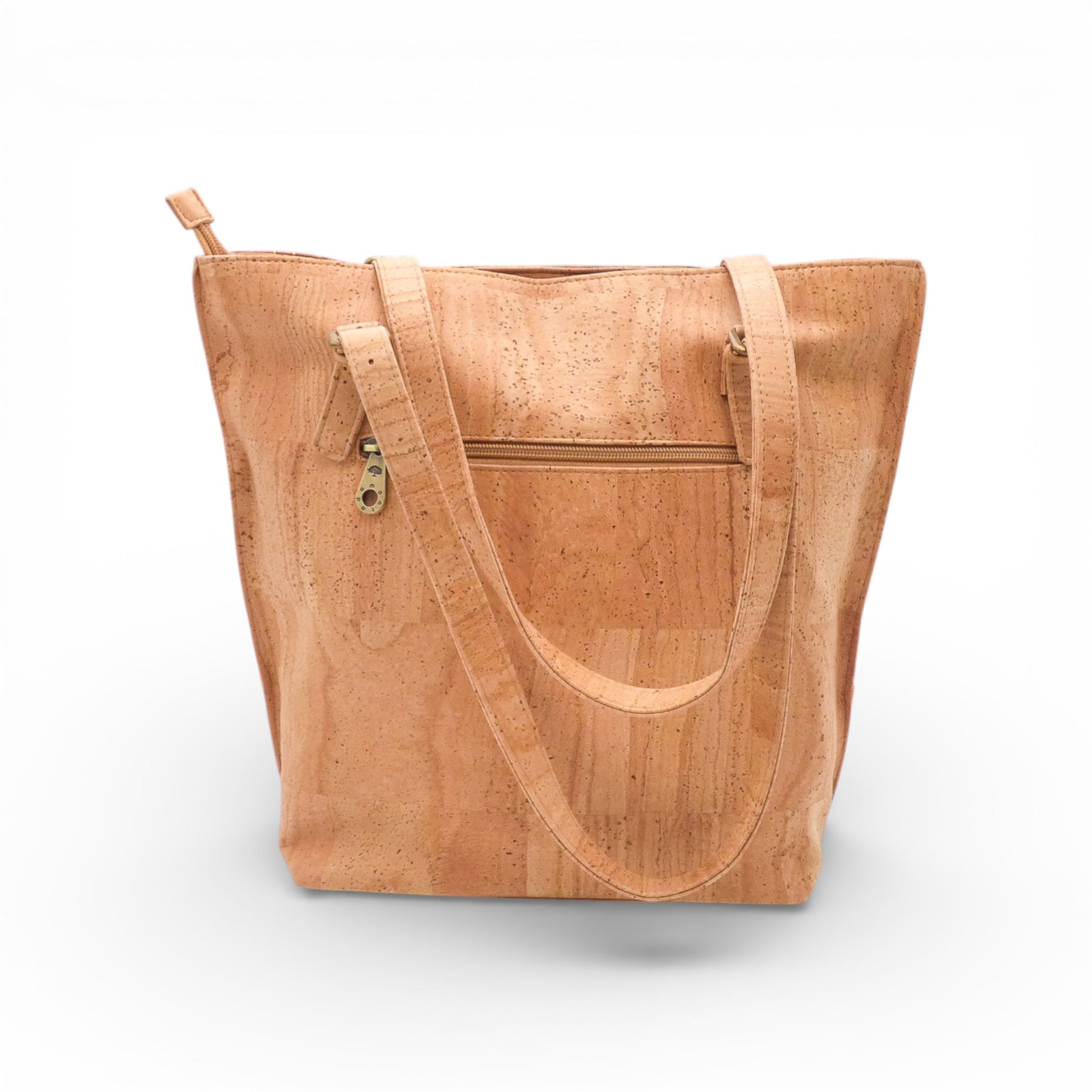 Sac épaule Montado en liège, avec design élégant et bandoulière ajustable, sur fond neutre.