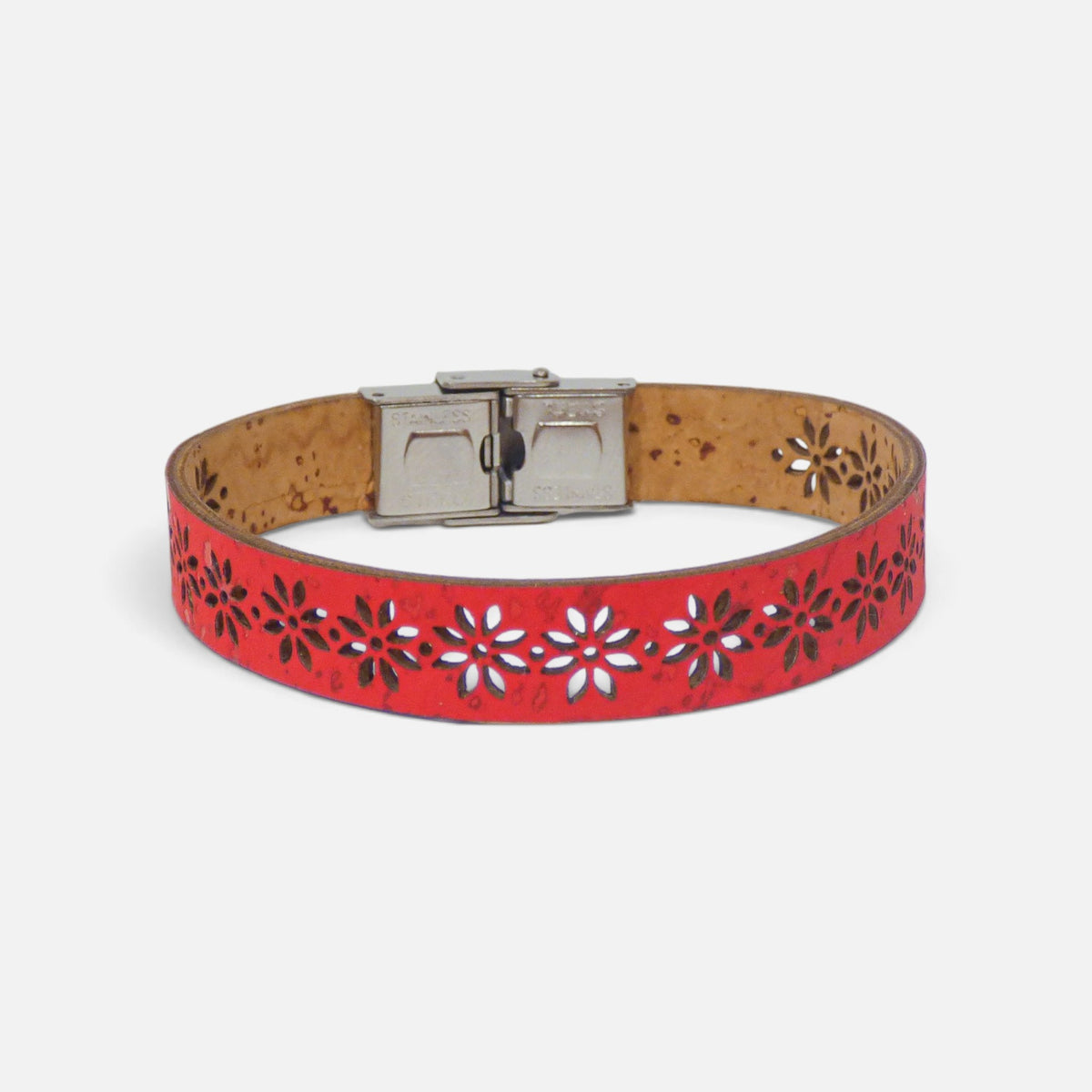 Bracelet en liège rouge vu de dessus, marguerites perforées en série