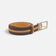 Ceinture bicolore en liège posée à plat, boucle ardillon nickelée