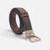 Ceinture en liège foncé enroulée, boucle dorée et double face visible